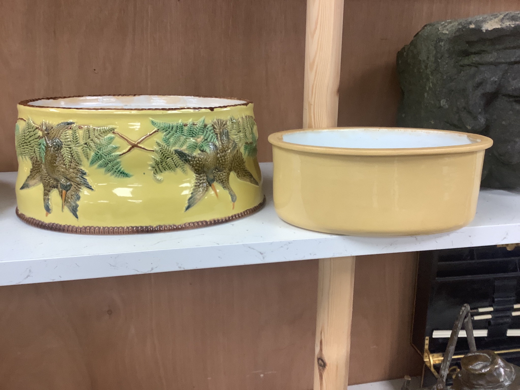 A Continental majolica game tureen with floral and bird relief, 18cm tall